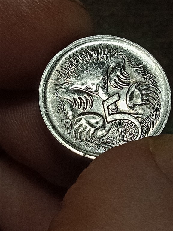 Strange-Radiating-Lines-On-1988-5-Cents